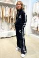 Купить Костюм спортивный черный с лампасами "С" MiniModa Мі23-29(3834М) на КидБутик Костюм спортивный черный с лампасами "С" MiniModa Мі23-29(3834М) - фото 5