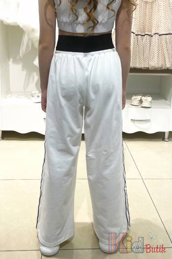 Купить Штаны спортивные палаццо "Fashion" молочного цвета для девочки WKS Wks24-10Мол на КидБутик Штаны спортивные палаццо "Fashion" молочного цвета для девочки WKS Wks24-10Мол