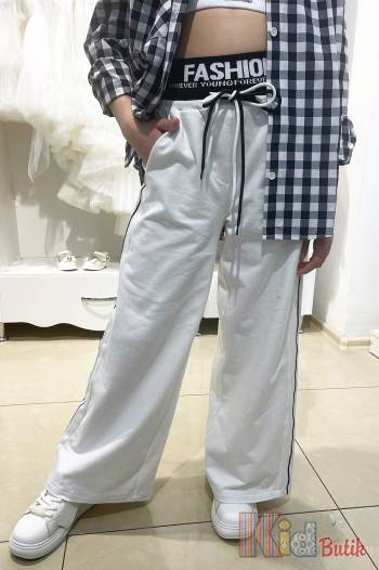 Купить Штаны спортивные палаццо "Fashion" молочного цвета для девочки WKS Wks24-10Мол на КидБутик Штаны спортивные палаццо "Fashion" молочного цвета для девочки WKS Wks24-10Мол